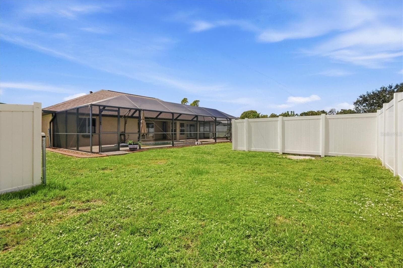 exterior back yard - more privacy with the fencing - 23108 AUGUST AVE, PORT CHARLOTTE