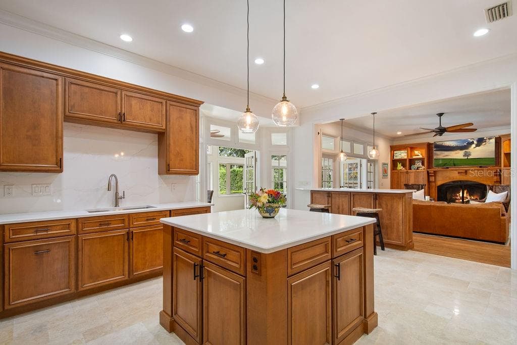 Island, with lead in to the family room - 555 E LAKE SUE AVE, WINTER PARK