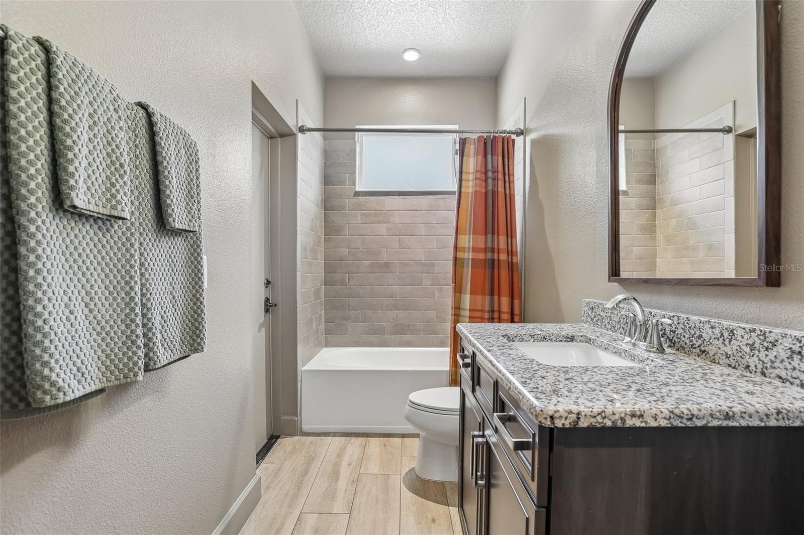 One of the Bedrooms is conveniently located near the THIRD FULL BATH, which also provides direct access to the pool area. - 19179 SABAL ST, ORLANDO