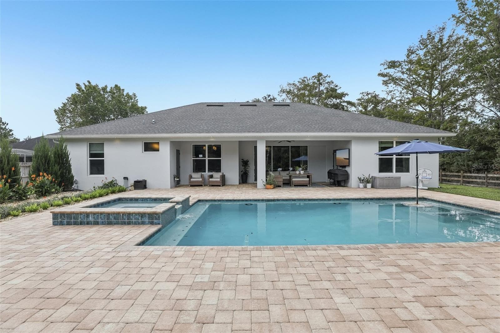 Step outside to your backyard retreat and enjoy the HEATED, SALT-WATER POOL AND SPA (2025). - 19179 SABAL ST, ORLANDO