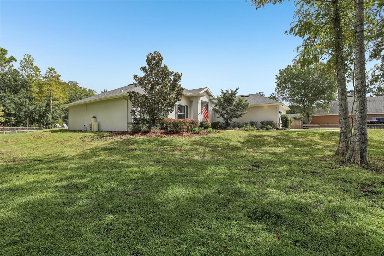With approximately 1.25 ACRES, a LUXURIOUS POOL AND SPA, NO HOA and TOP SCHOOLS, this Wedgefield home offers a rare combination of space, style and Florida lifestyle. - 19179 SABAL ST, ORLANDO