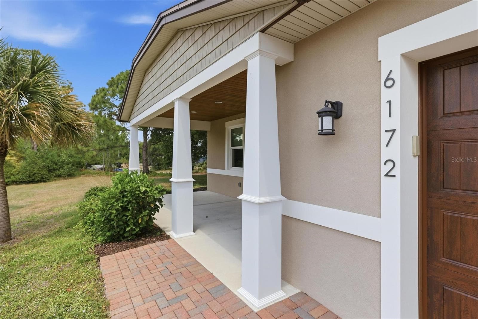 Large covered front porch - 6172 ALHAMBRA AVE, NORTH PORT