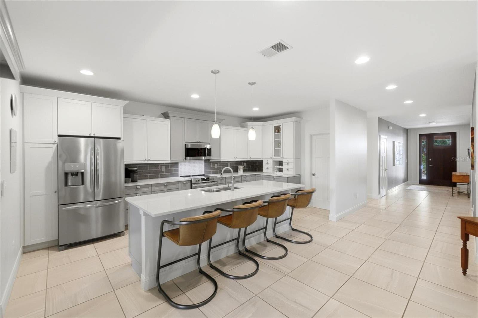 Spacious open kitchen with large island and seating - 6172 ALHAMBRA AVE, NORTH PORT