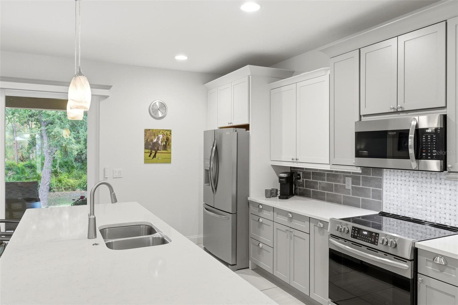 Kitchen equipped with stainless Frigidaire Gallery Collection appliances - 6172 ALHAMBRA AVE, NORTH PORT