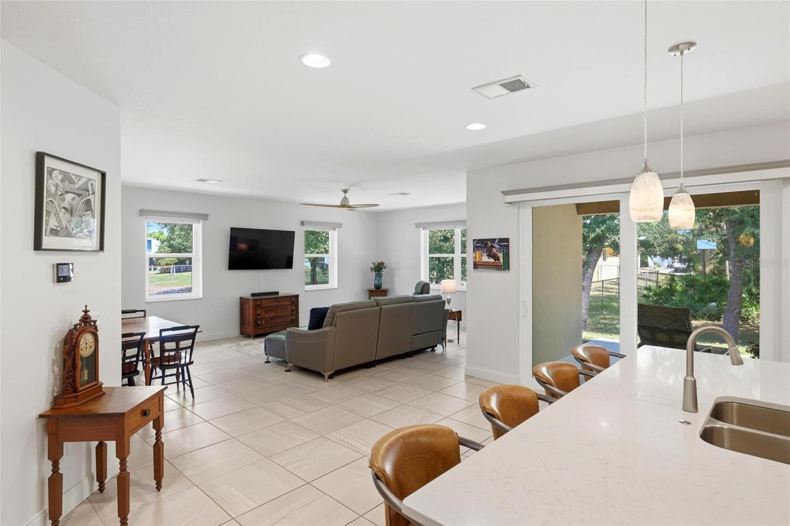 Living and dining area open to kitchen - 6172 ALHAMBRA AVE, NORTH PORT