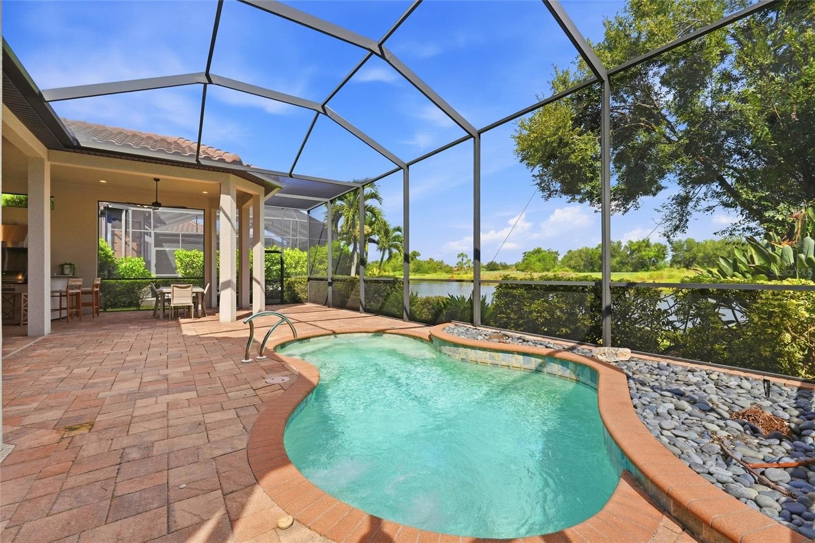 Pool enclosure rescreened in 2025 - 13309 MALACHITE DR, BRADENTON