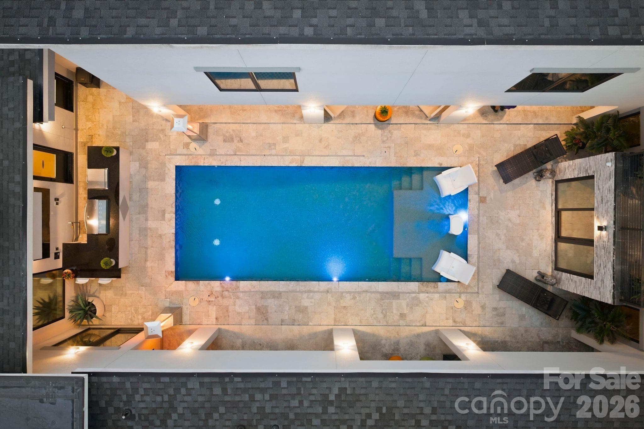 Private resort-style courtyard featuringHeated saltwater pool - 15700 Youngblood Road, Charlotte