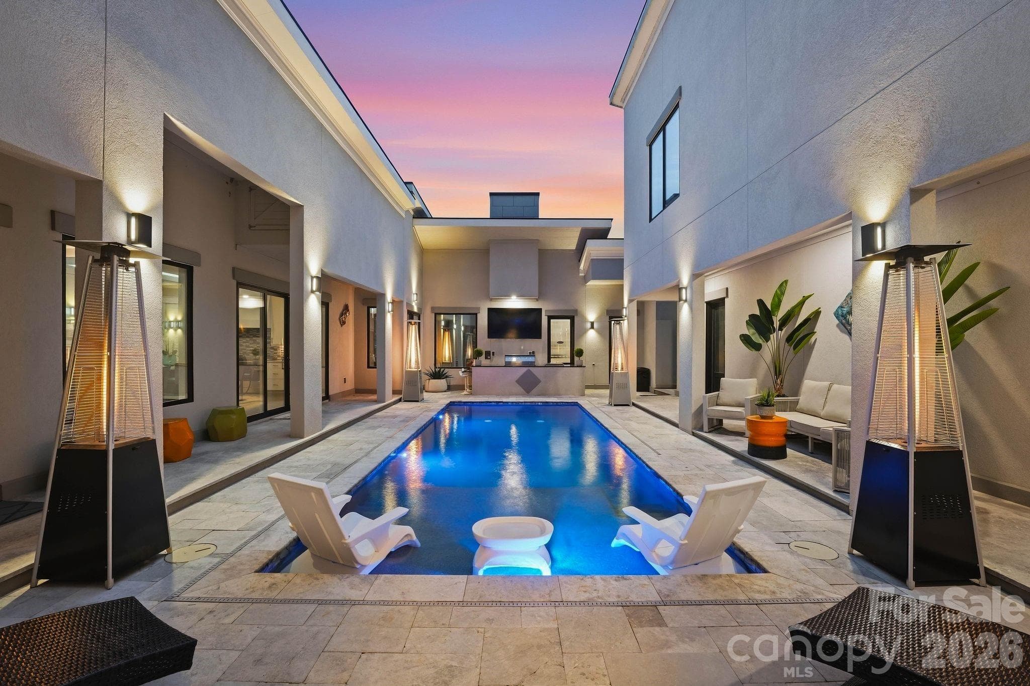 Private resort-style Courtyard featuringHeated saltwater pool - 15700 Youngblood Road, Charlotte