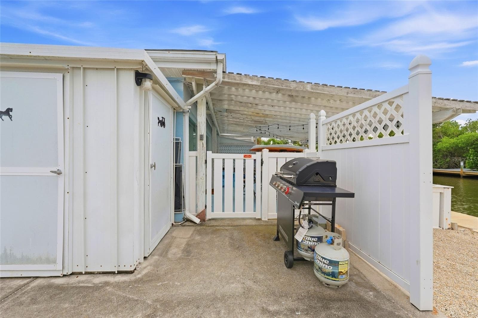 Extended patio area for BBQ - 28 SEASIDE CT, HOLMES BEACH