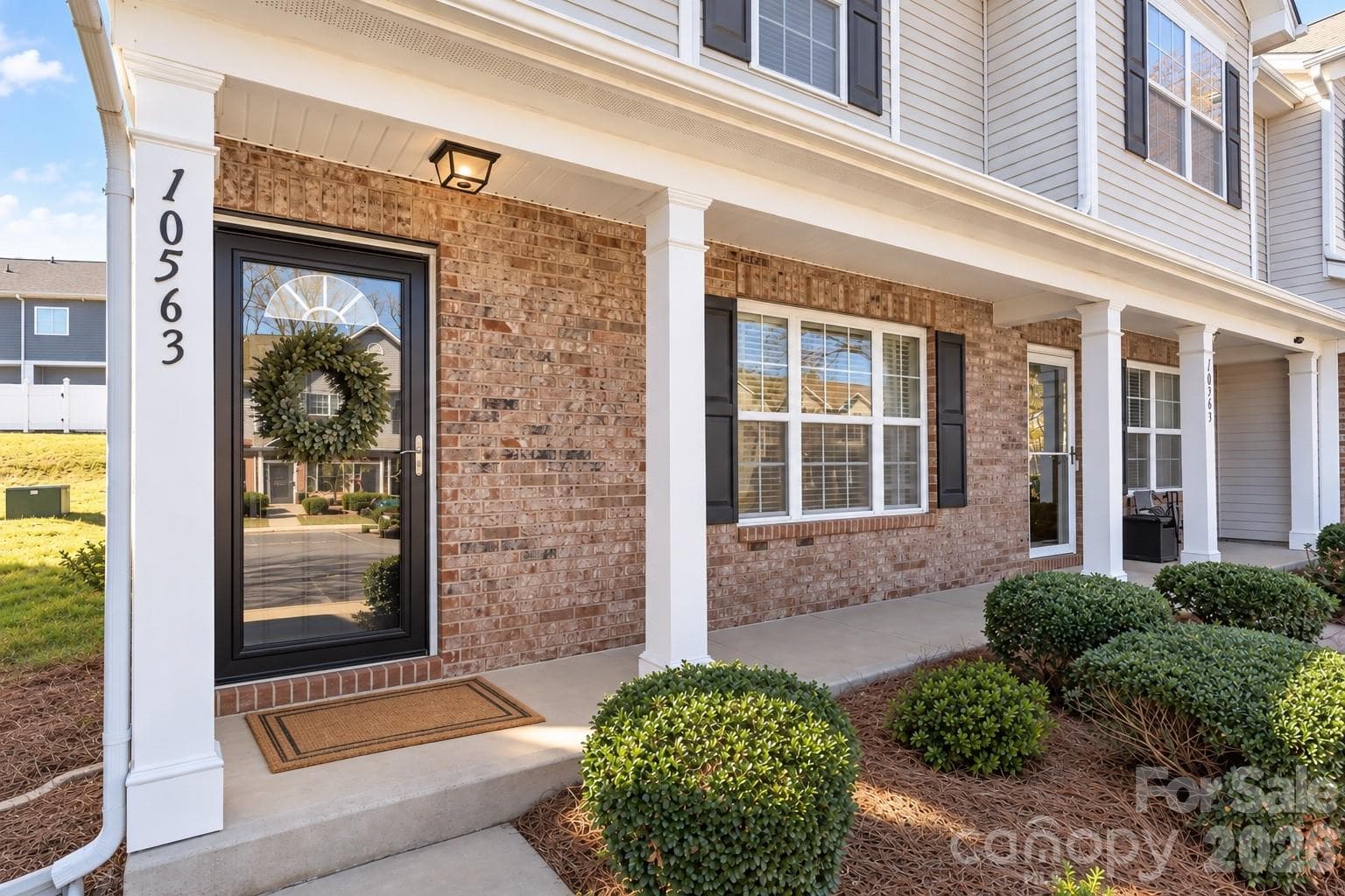 Covered Front Porch - *Photo has been virtually enhanced - 10563 Stoneacre Court, Pineville