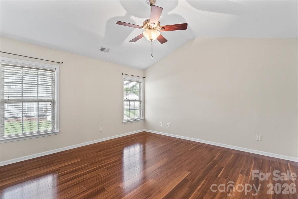 Primary Bedroom w/ vaulted ceilings - 10563 Stoneacre Court, Pineville