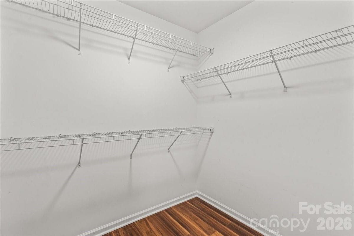Primary Walk-in closet - 10563 Stoneacre Court, Pineville
