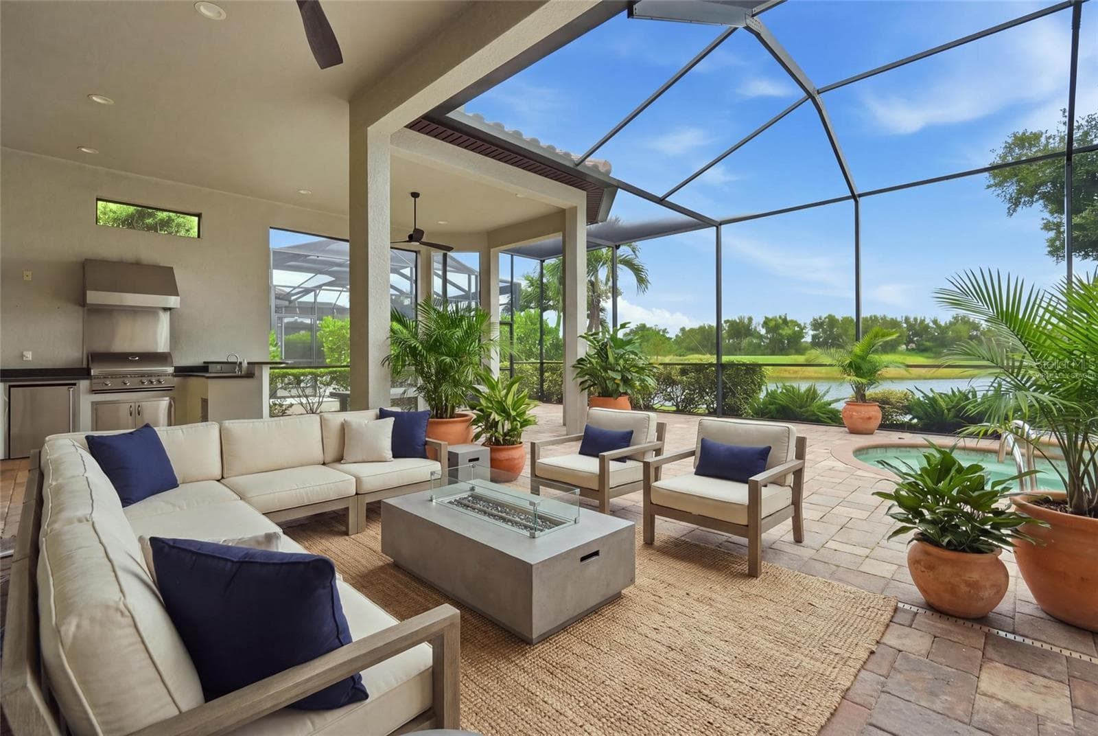 Virtually staged. Furniture and firepit digitally added. - 13309 MALACHITE DR, BRADENTON