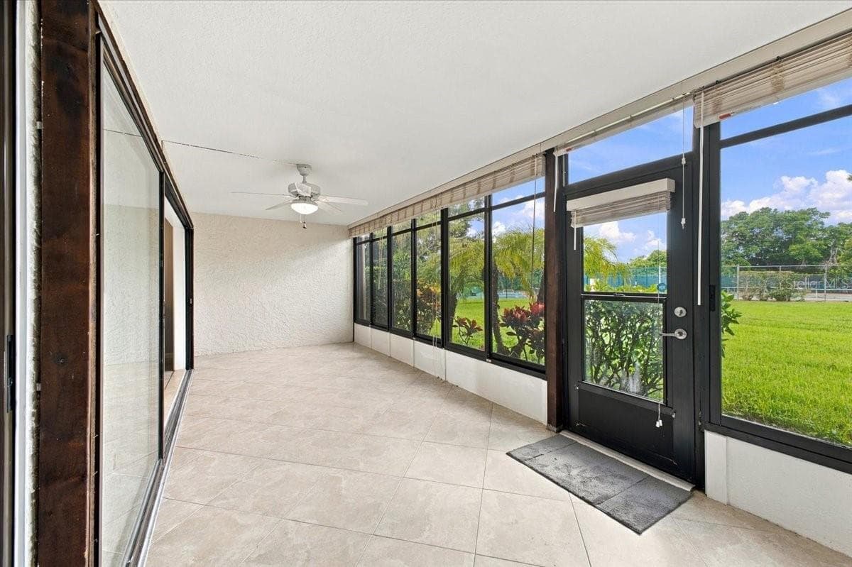Florida view looking at tennis court/pickleball courts - 411 PALM TREE DR #411, BRADENTON
