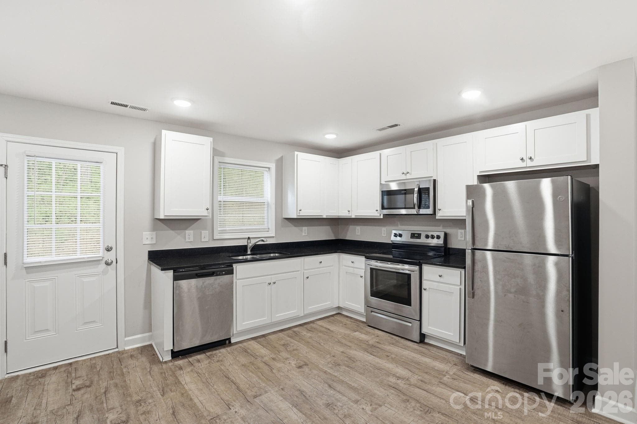 Townhouse at 153 Mckinnon Avenue NE, Concord, photo 8 of 36