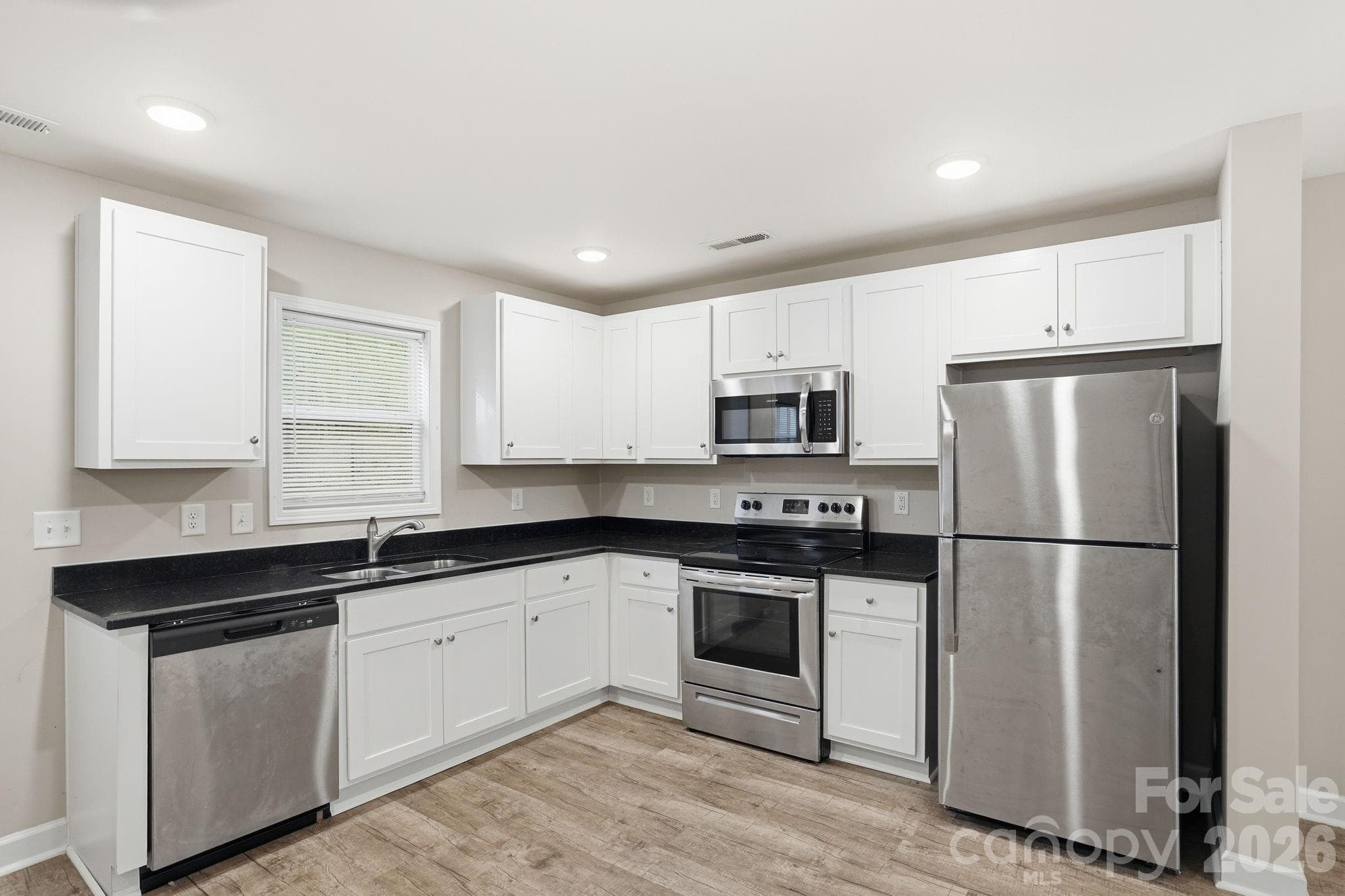Townhouse at 153 Mckinnon Avenue NE, Concord, photo 9 of 36