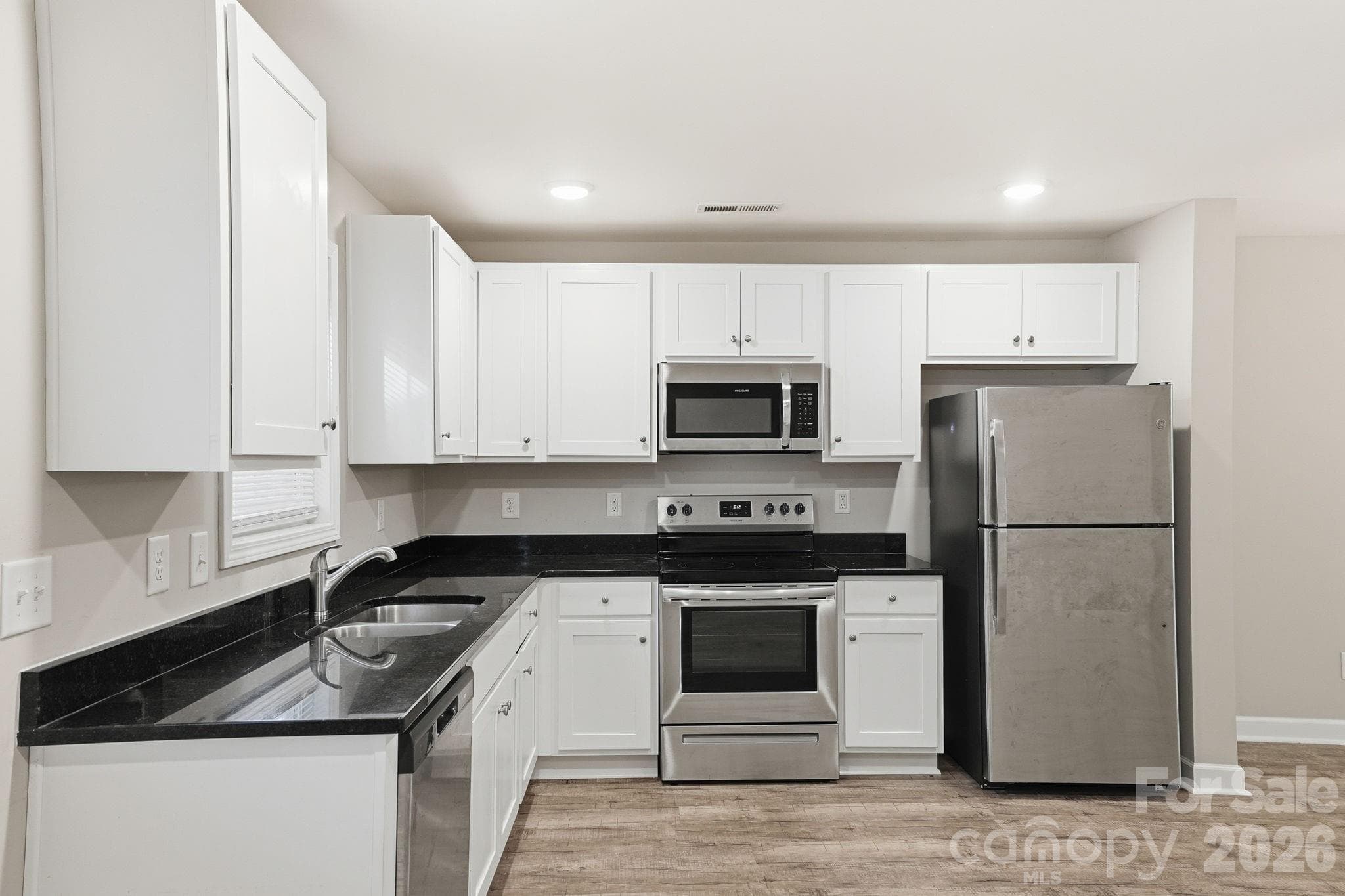 Townhouse at 153 Mckinnon Avenue NE, Concord, photo 10 of 36