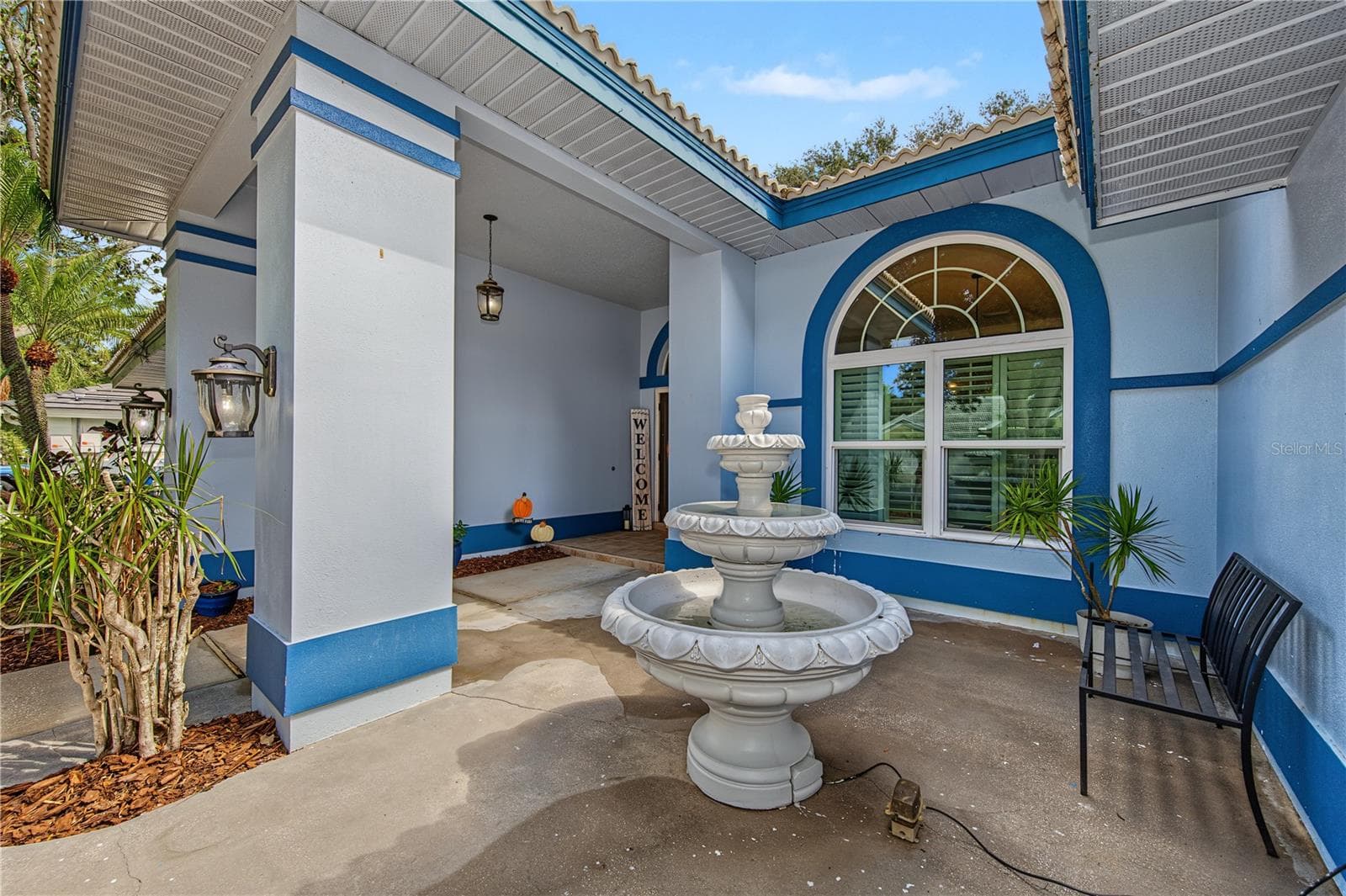 Front view with fountain - 2233 PINNACLE CIR S, PALM HARBOR