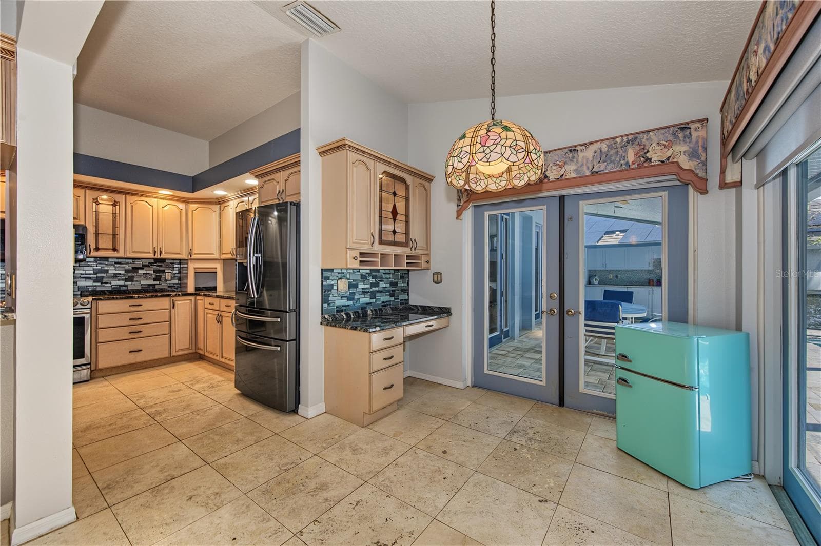 kitchen and eat in area - 2233 PINNACLE CIR S, PALM HARBOR