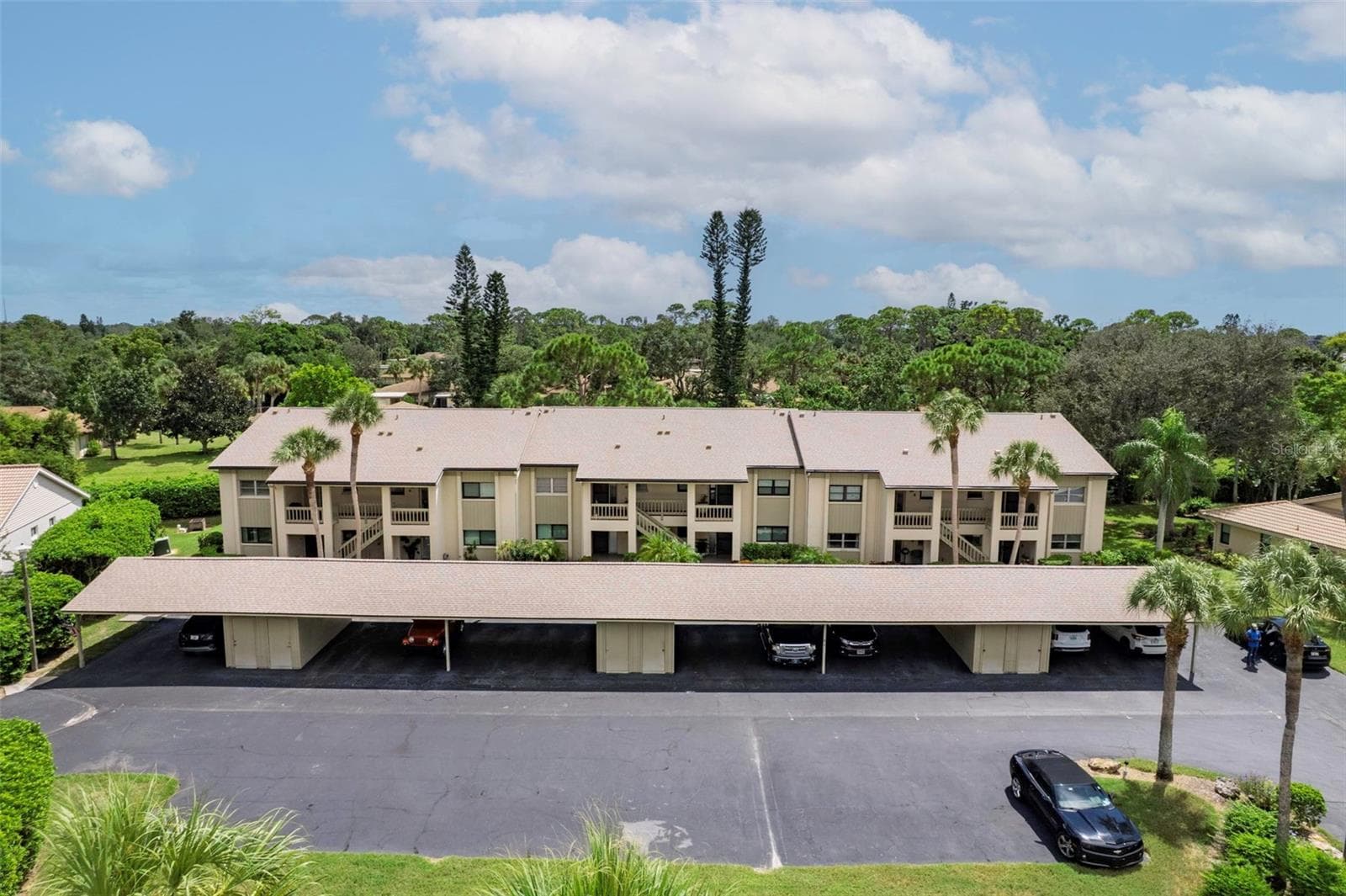 carport & storage @ your doorstep ! - 7143 WOOD CREEK DR #203, SARASOTA