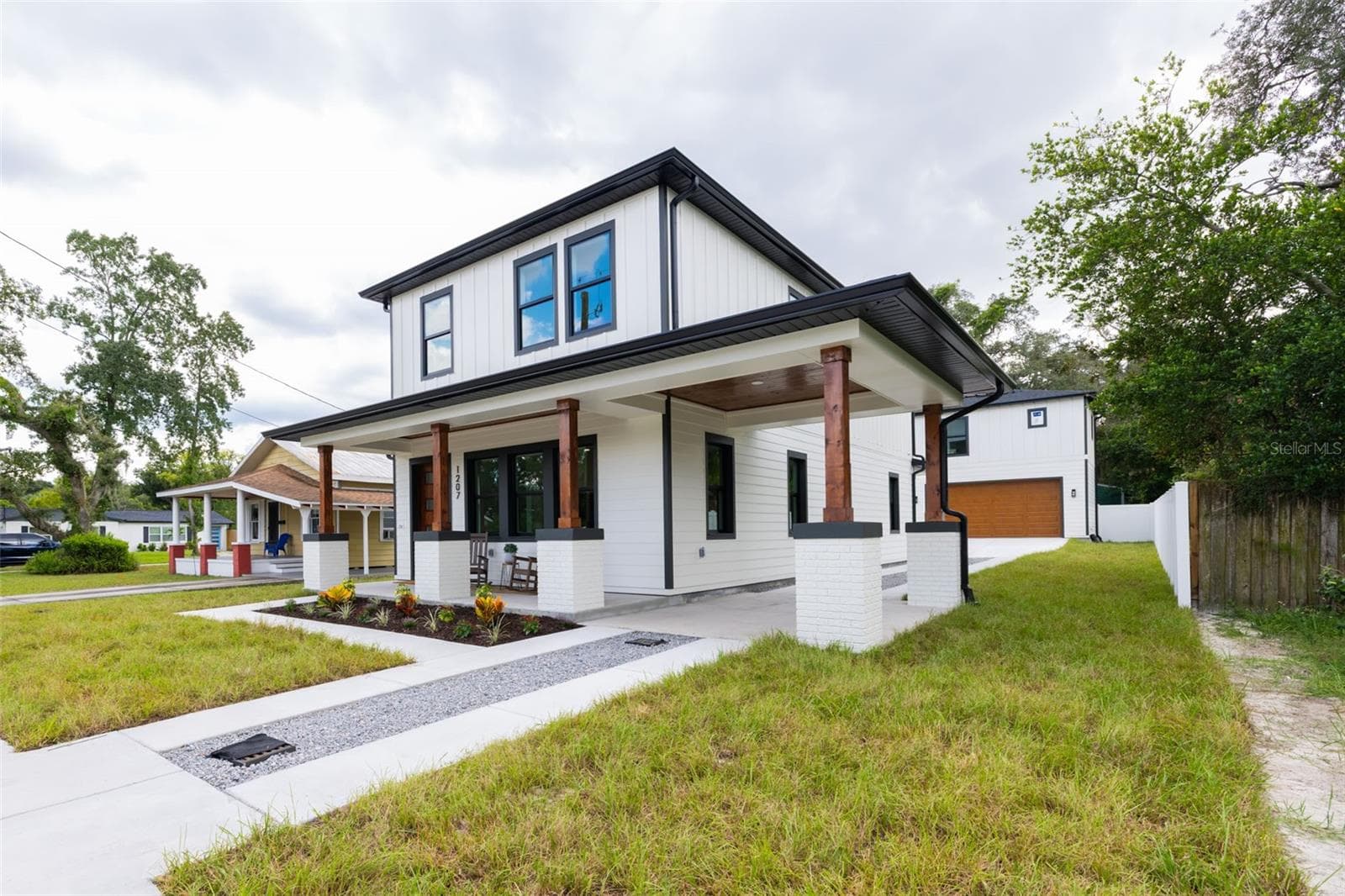 Single Family Residence at 1207 E ELLICOTT ST, TAMPA, photo 3 of 76