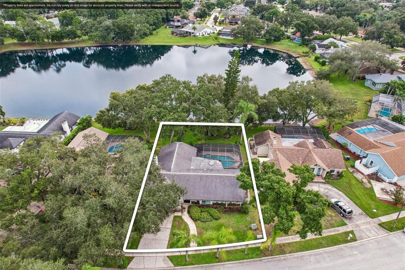 Single Family Residence at 5050 LAKE VALENCIA BLVD W, PALM HARBOR, photo 29 of 37