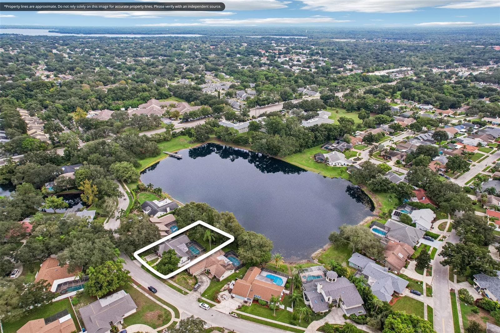 Single Family Residence at 5050 LAKE VALENCIA BLVD W, PALM HARBOR, photo 30 of 37