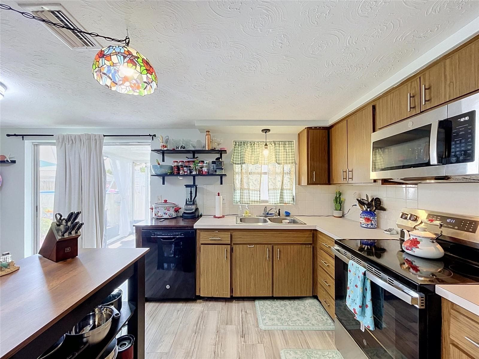 Single Family Residence at 3748 REDWOOD DR, HOLIDAY, photo 11 of 42
