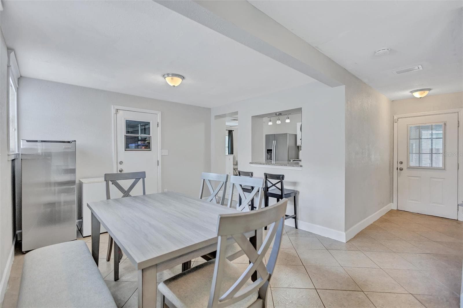 Dining area with entrance to the yard - 5337 2ND AVE N, ST PETERSBURG