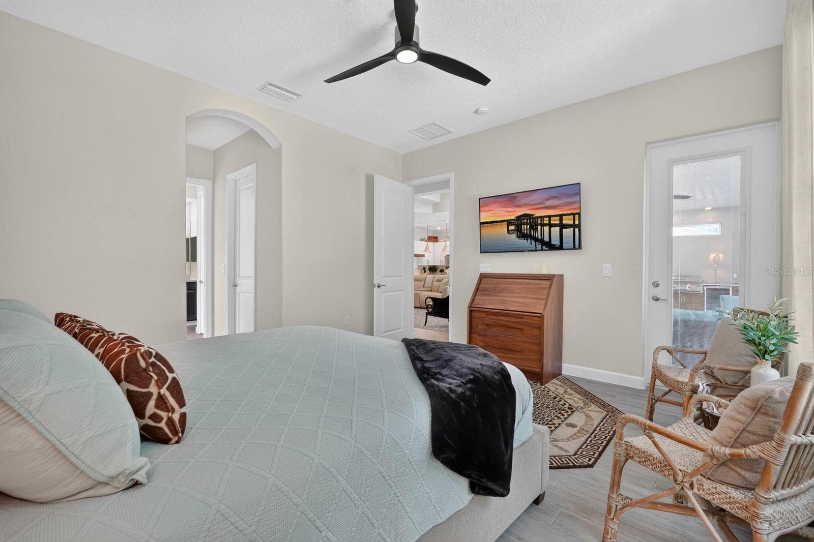 Primary bedroom has door access to pool area - 36 NEW WATER OAK DR, PALM COAST
