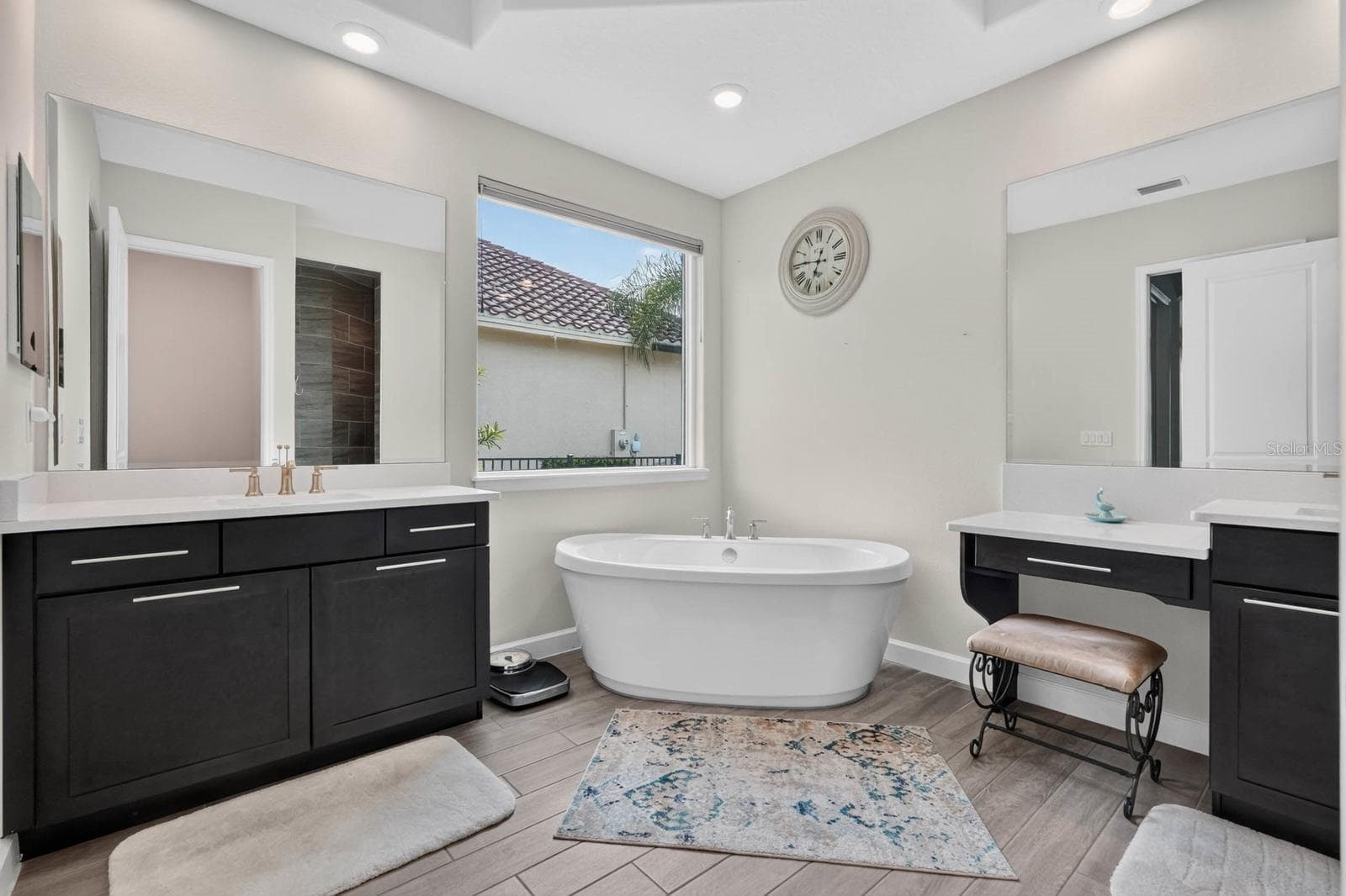 separate vanities with quartz countertops, soaking tub - 36 NEW WATER OAK DR, PALM COAST