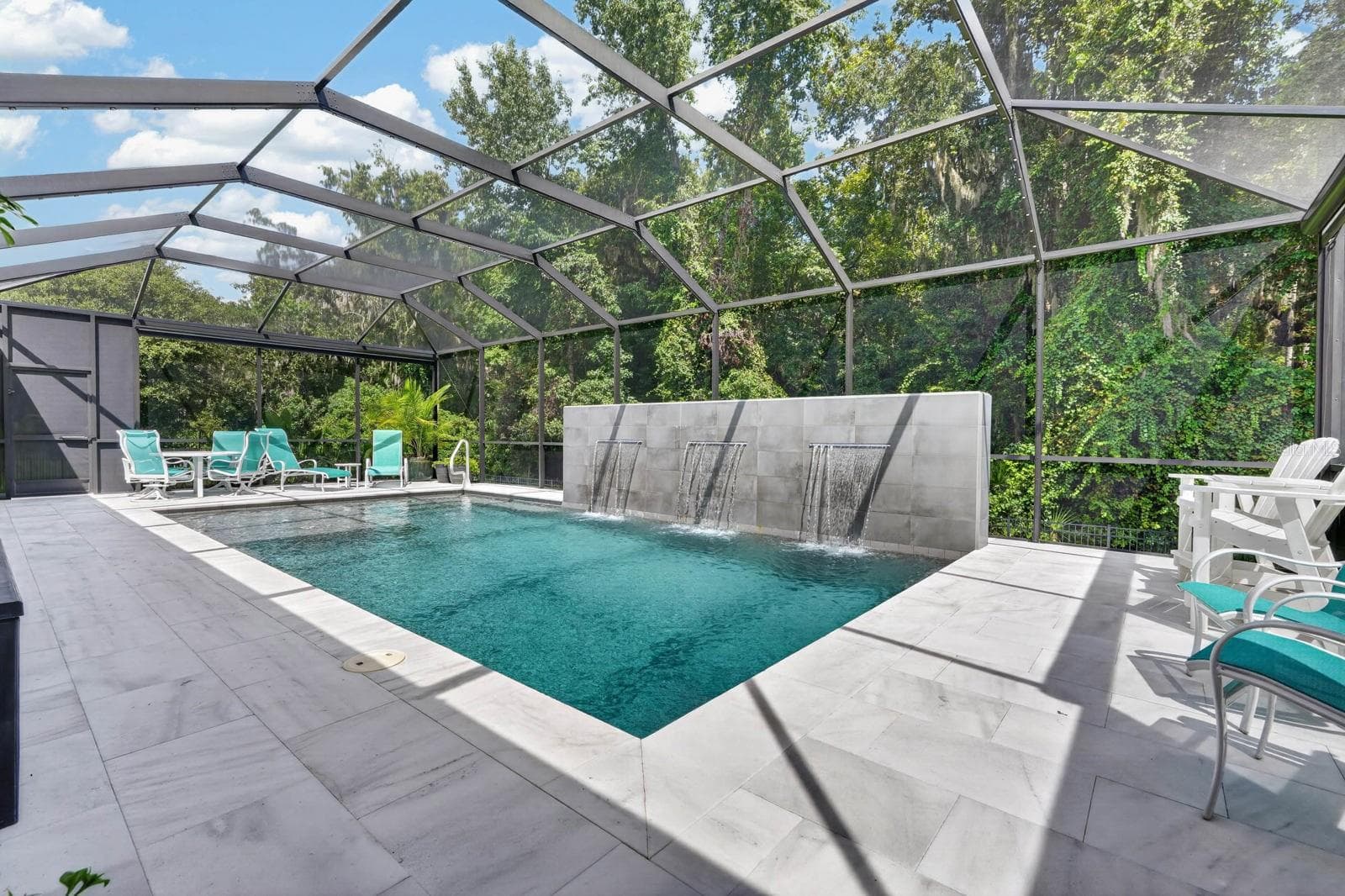 pool surround is a sealed marble surface that stays cool on the feet - 36 NEW WATER OAK DR, PALM COAST