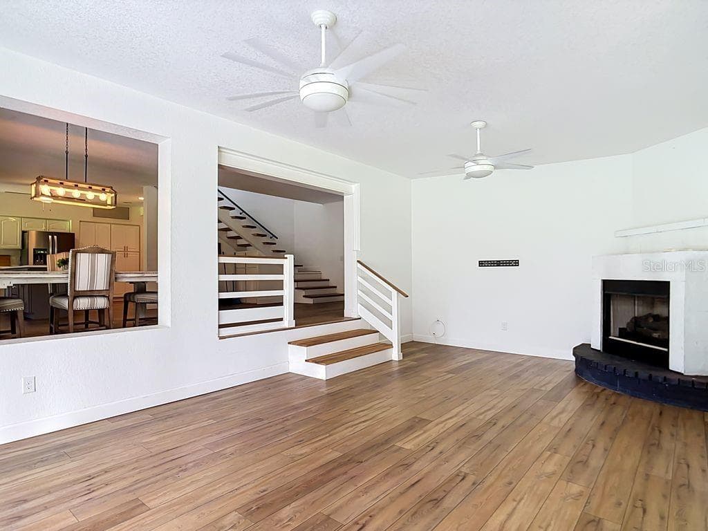 Sunken Living Room with Fireplace - 1409 LAVILLA RD, PUNTA GORDA