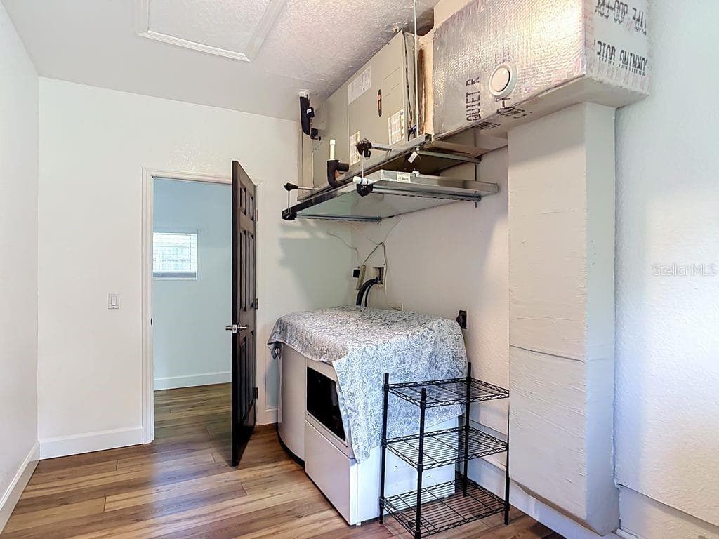 Laundry Room Conveniently Located Near Downstairs Primary Bedroom - 1409 LAVILLA RD, PUNTA GORDA