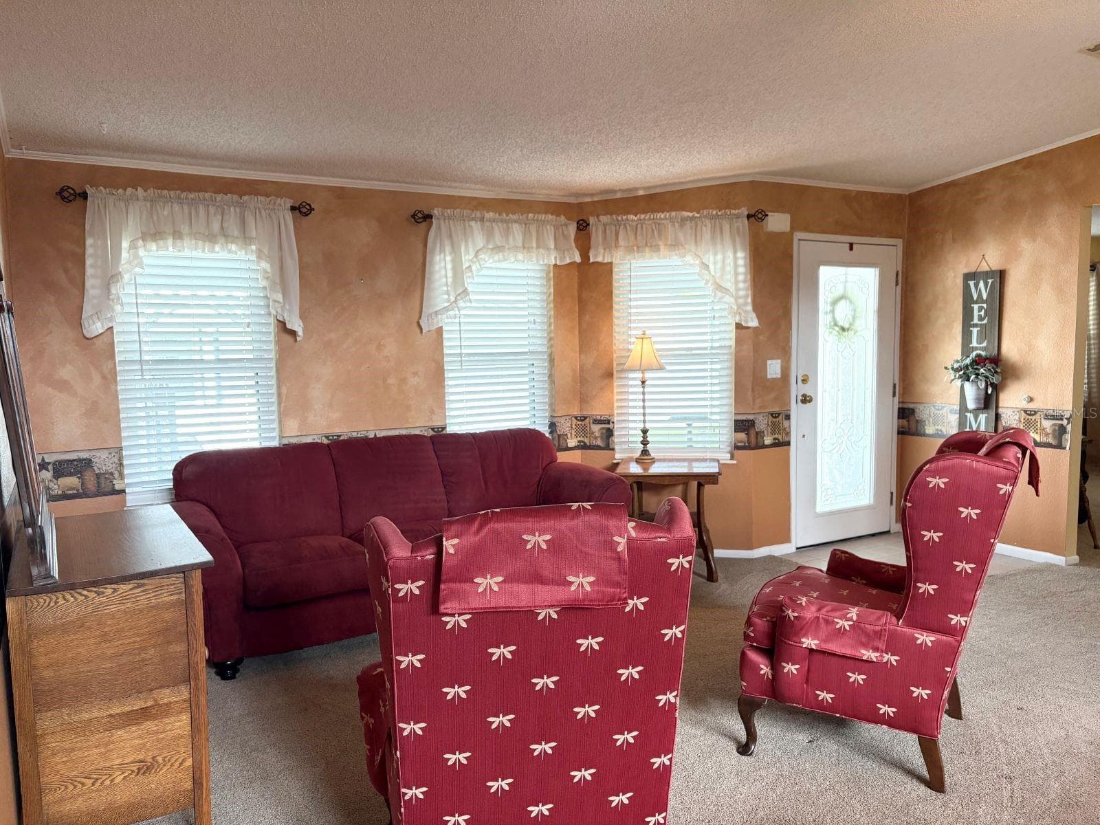 Living room open to dining room and side entrance - 809 STARBOARD AVE, EDGEWATER