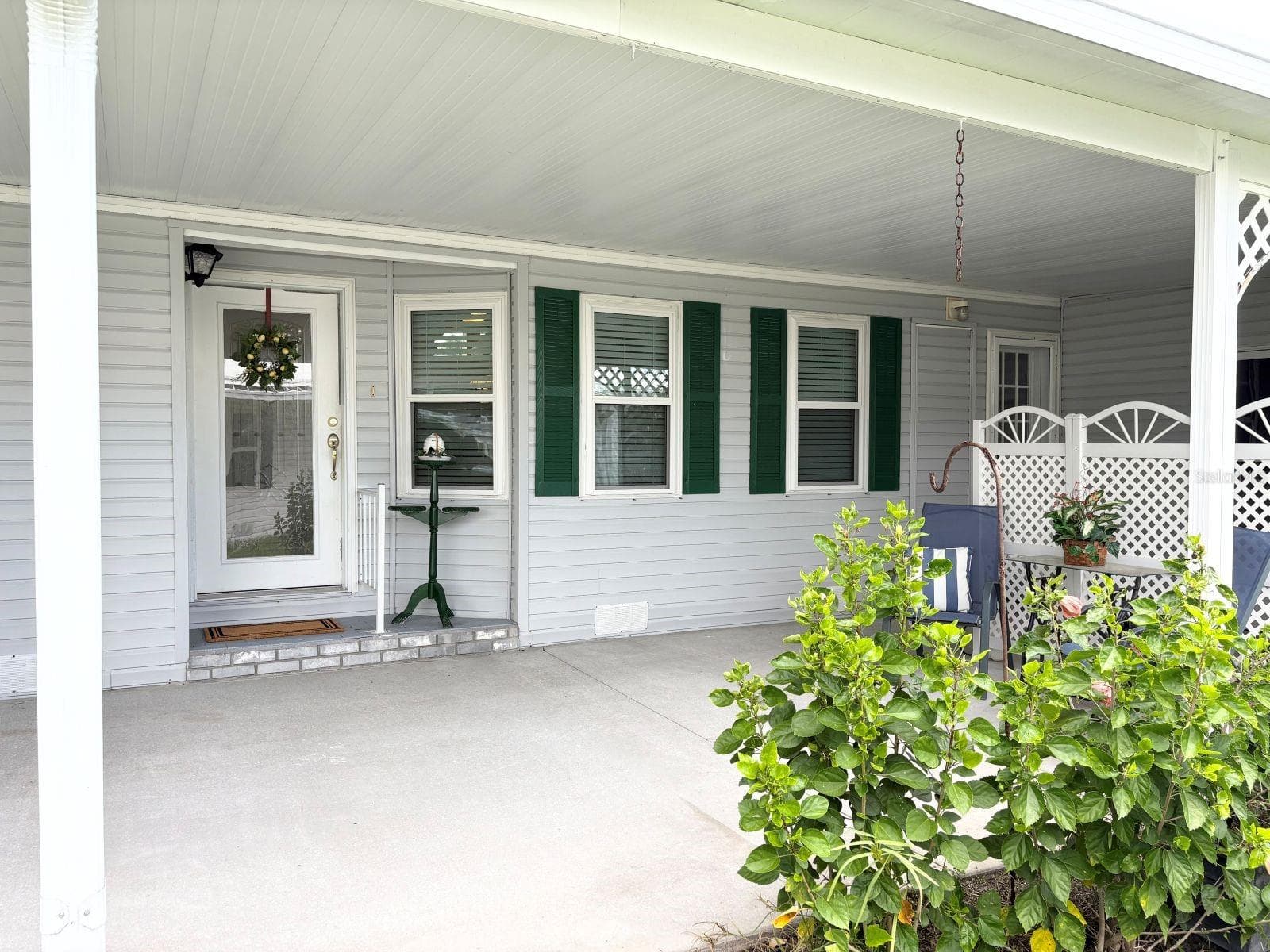 Carport with home entrance - 809 STARBOARD AVE, EDGEWATER