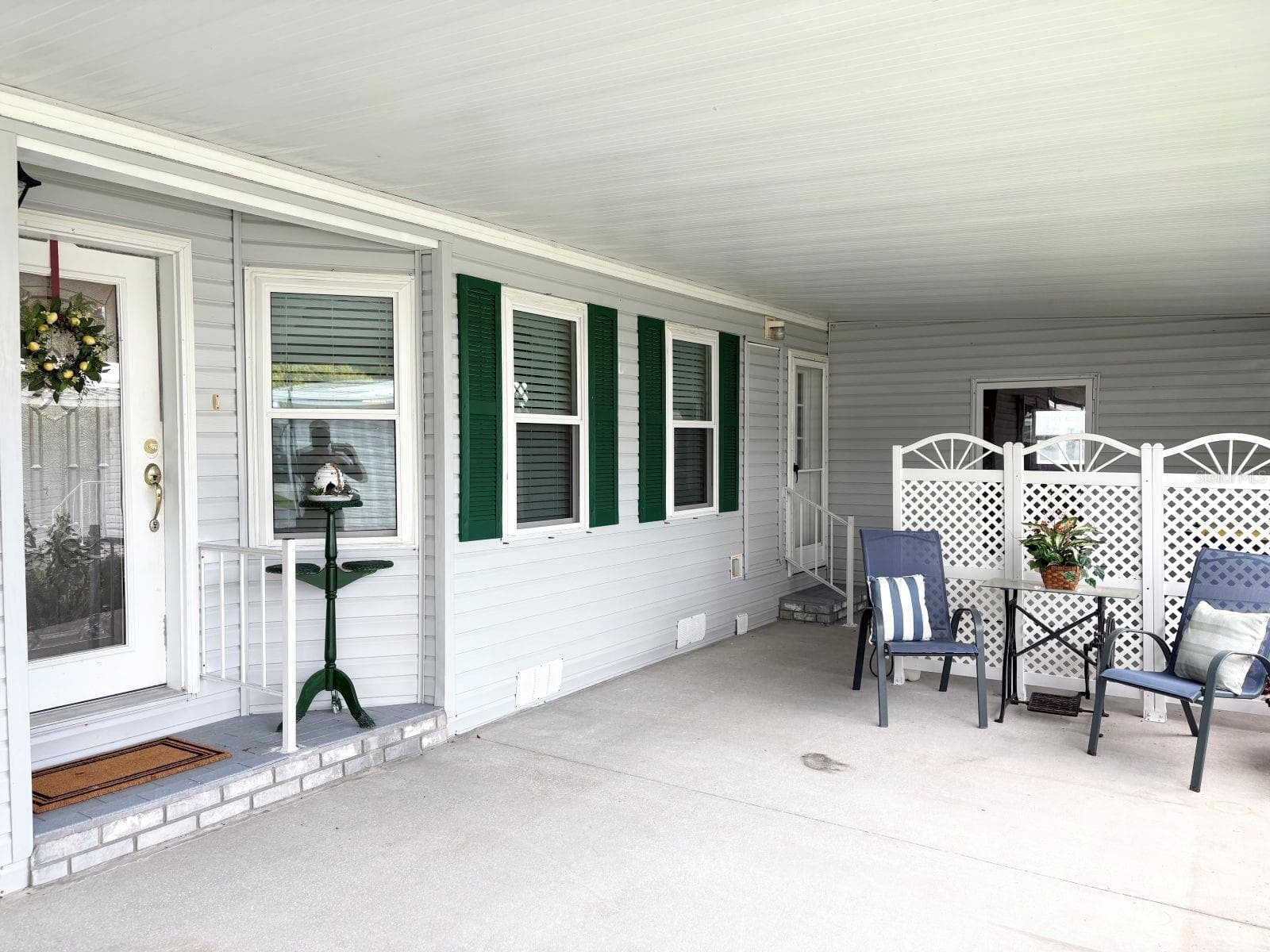 Covered carport and patio with storage shed - 809 STARBOARD AVE, EDGEWATER