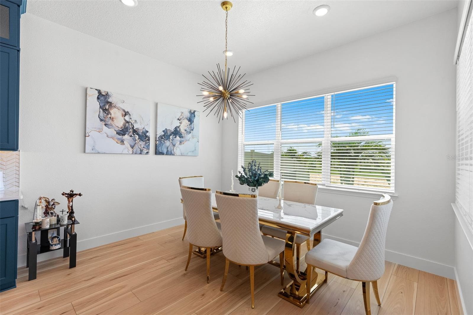 Light filled casal dining overlooking the backyard. - 4617 GOLDEN BIRCH AVE, CLERMONT