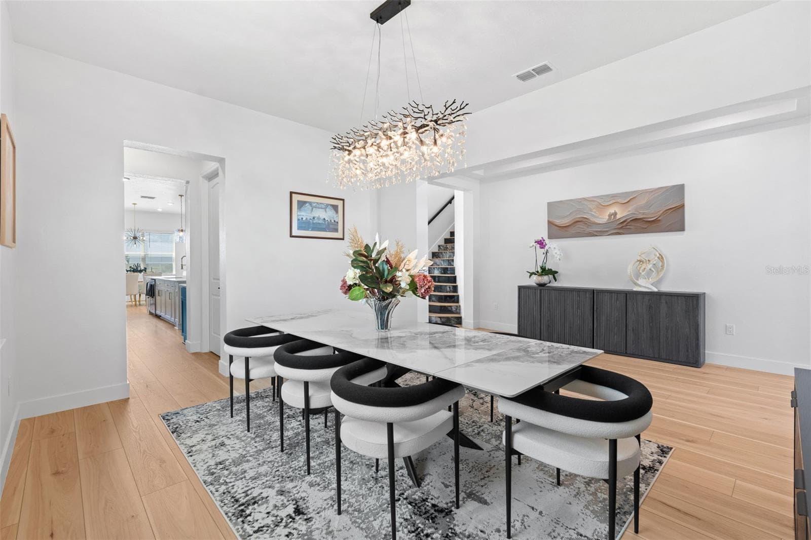 The main floor has a seamless flow from formal to family spaces. - 4617 GOLDEN BIRCH AVE, CLERMONT