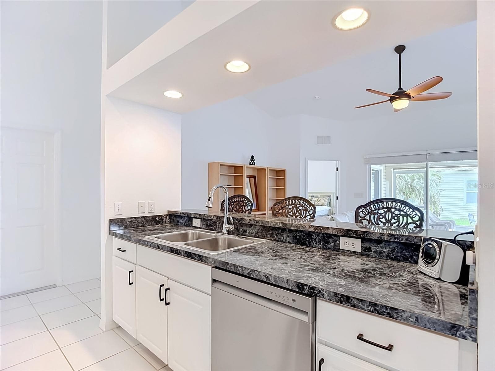 Kitchen - Breakfast Bar - Living Room - 572 SALMON CT, OLDSMAR