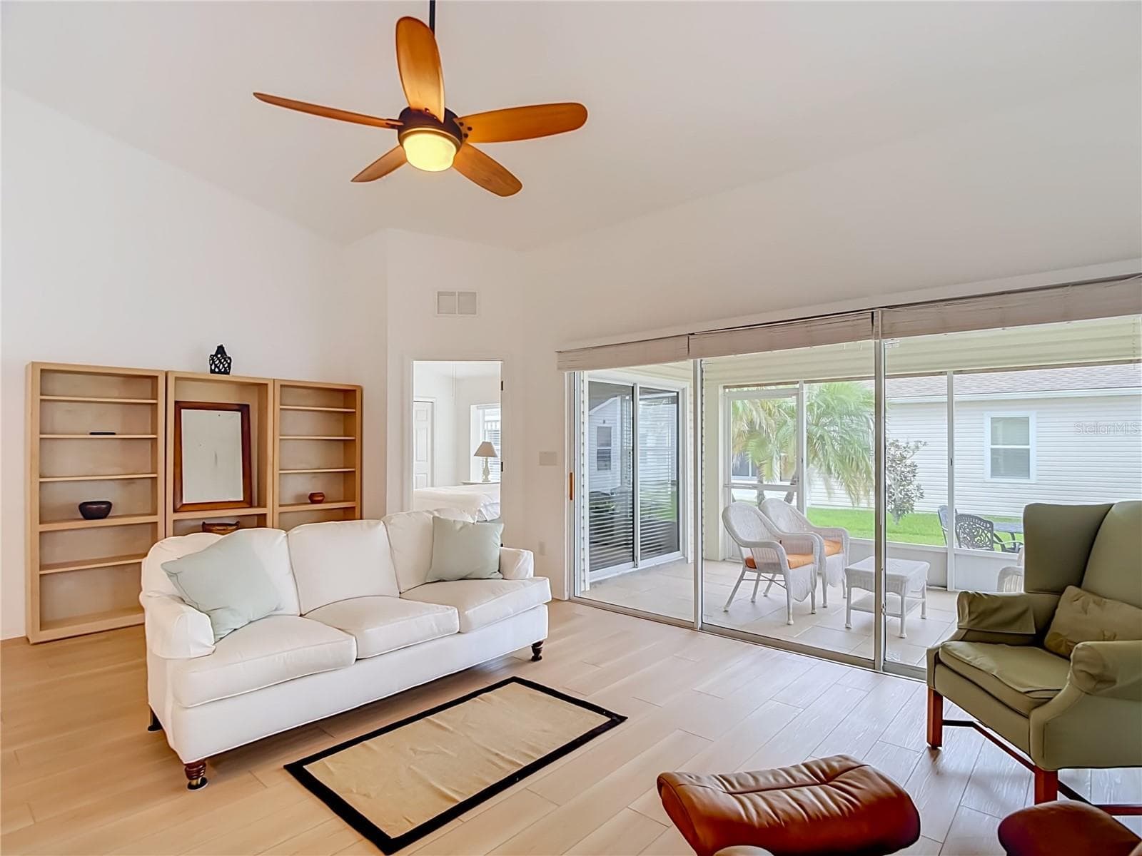 Living Room - Triple Sliding Doors to OUtdoor Living Space - 572 SALMON CT, OLDSMAR