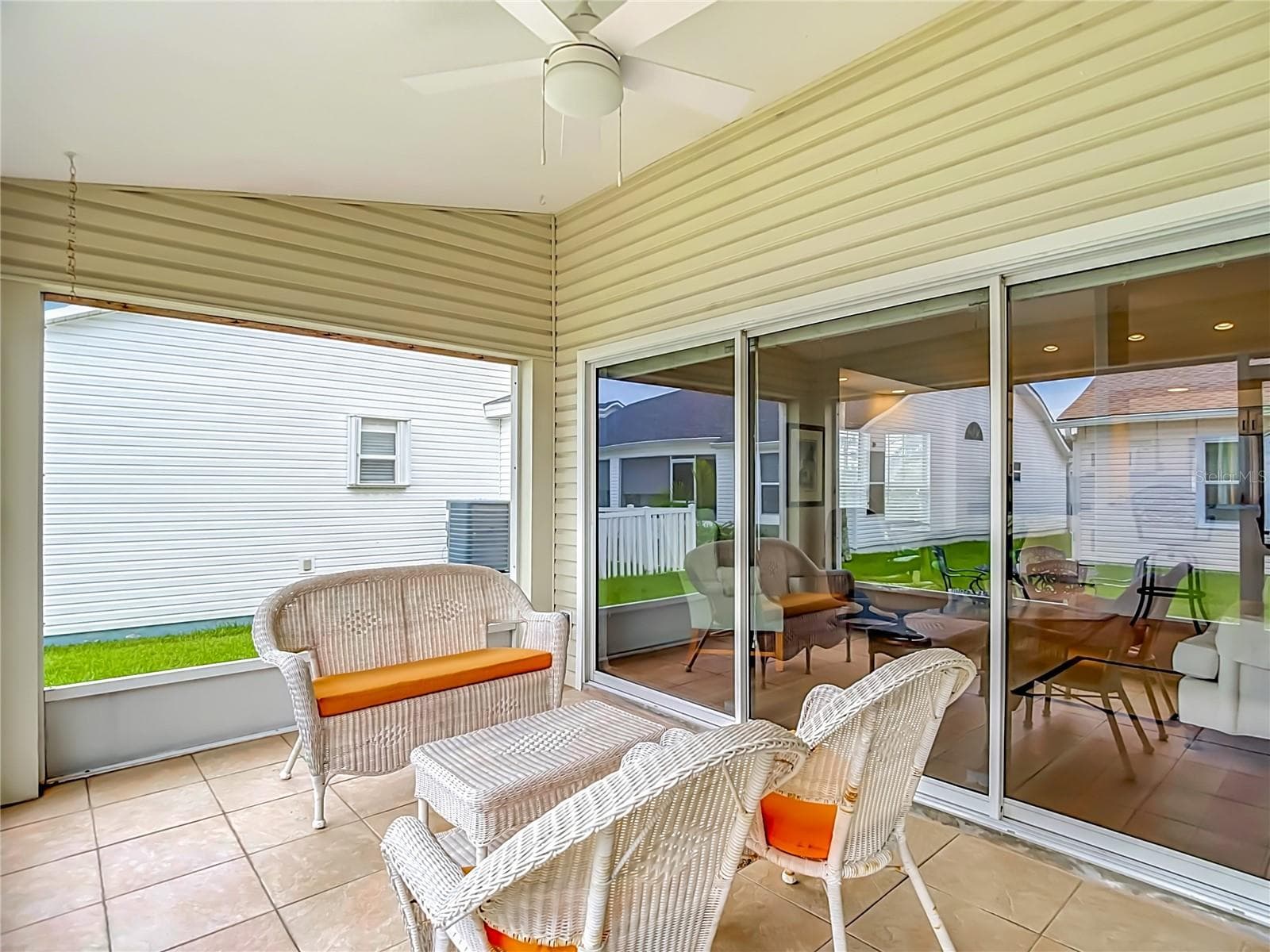 Outdoor Living Space - Triple Sliding Doors to Living Room - 572 SALMON CT, OLDSMAR