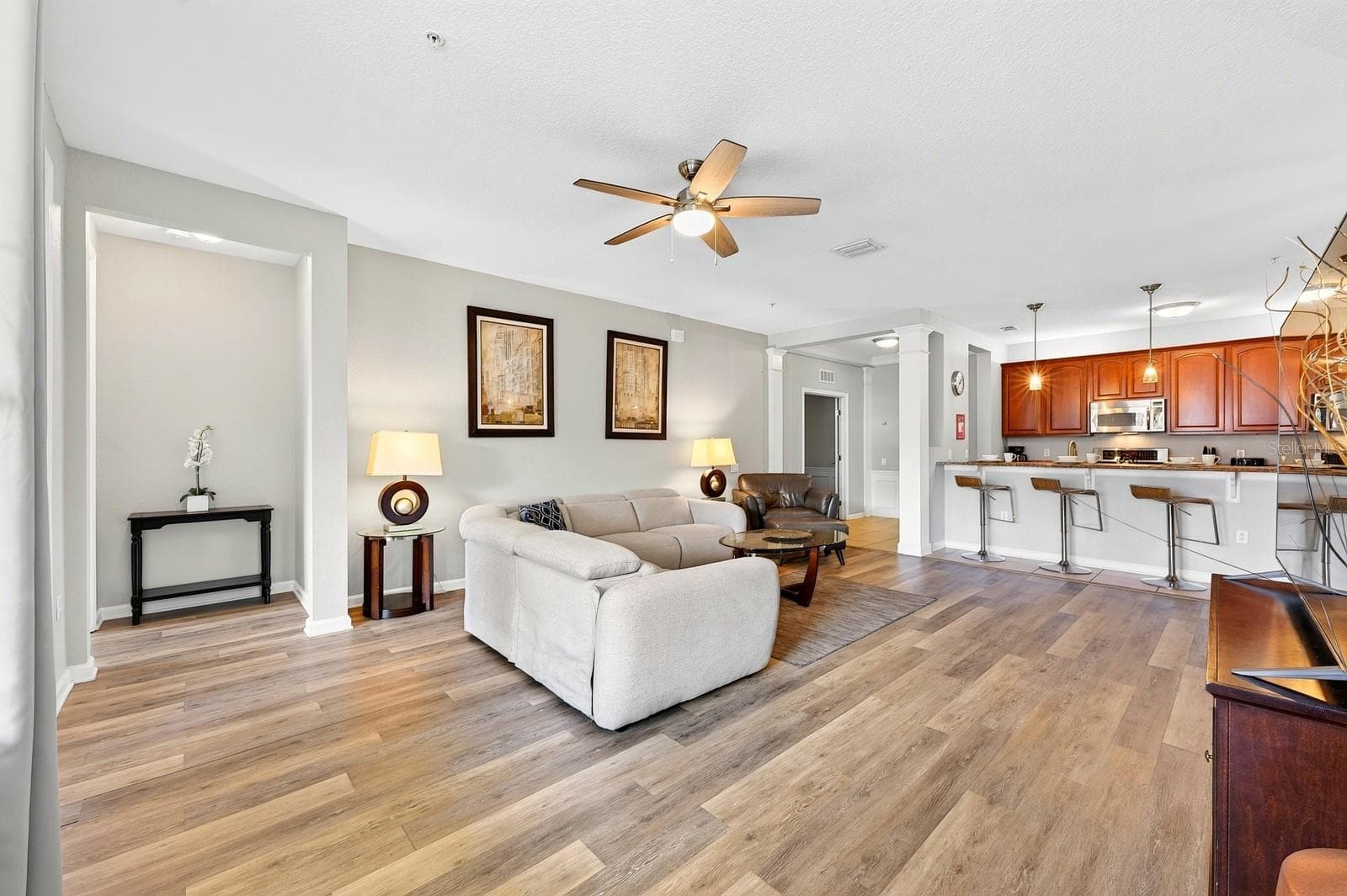Living area is open to the kitchen. - 5049 SHOREWAY LOOP #1-201, ORLANDO