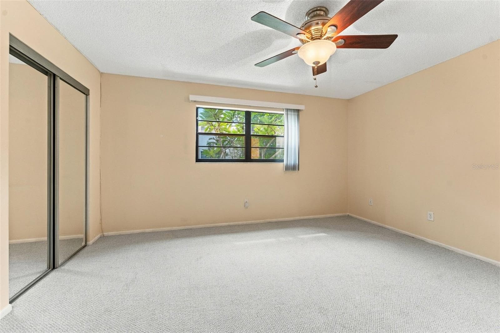 Primary bedroom, view 2 - 5971 TERRACE PARK DR N #108, ST PETERSBURG