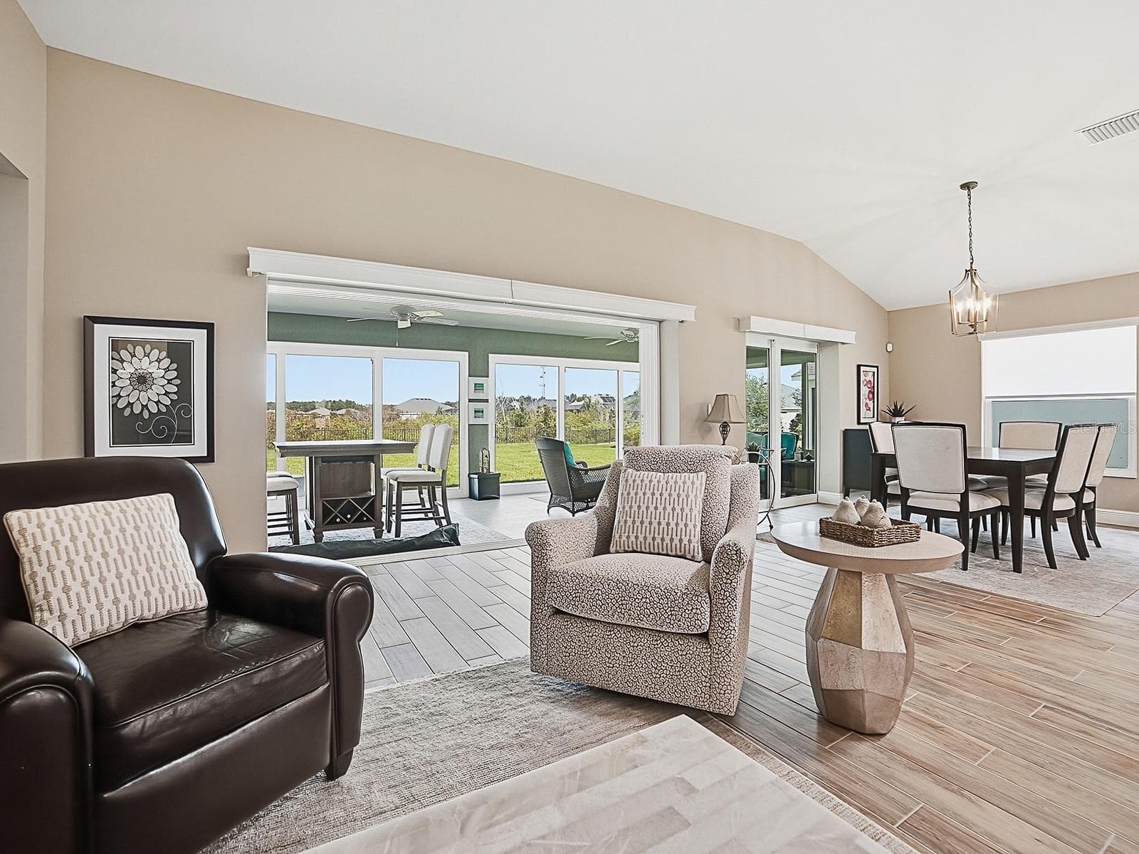 STACKBACK DOORS OFF OF THE LIVING ROOM FOR A WIDE OPEN VIEW! - 3075 LICCIARDELLO PATH, THE VILLAGES