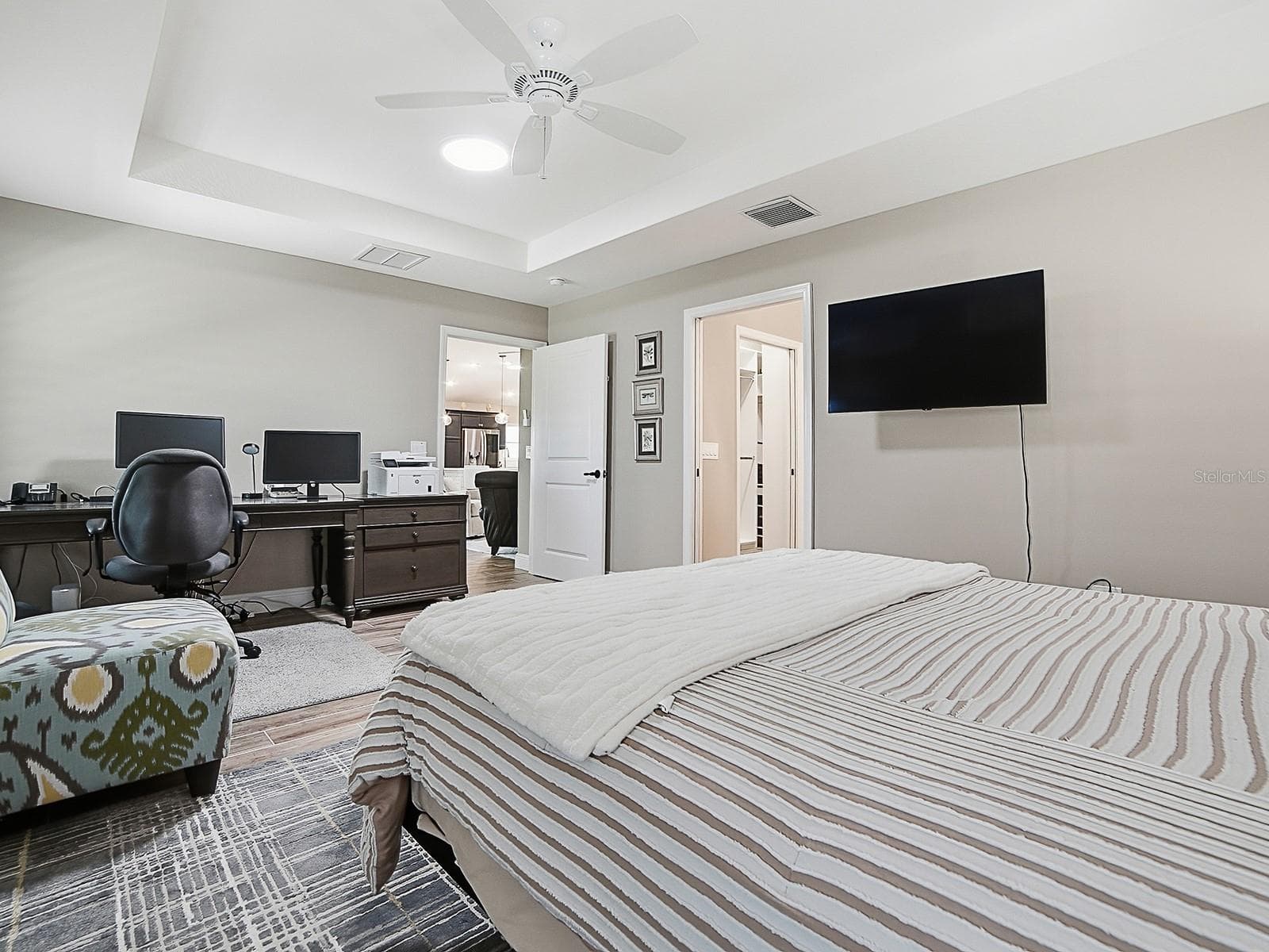 THIS DOOR LEADS TO THE EN-SUITE BATHROOM AND LARGE WALK-IN CLOSET. - 3075 LICCIARDELLO PATH, THE VILLAGES