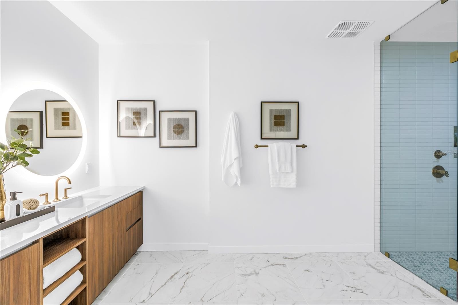 dual sink vanity , spacious walk in shower, plus separate water closet - 777 3RD AVE N #1703, ST PETERSBURG