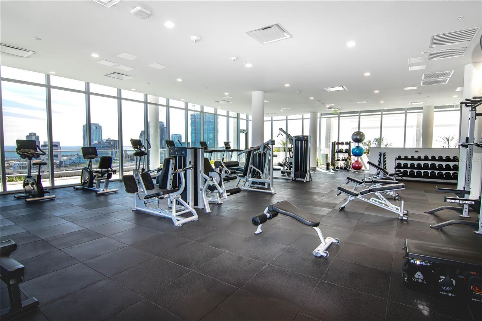 nice size fitness room with views of the city all the way to Tampa Bay - 777 3RD AVE N #1703, ST PETERSBURG