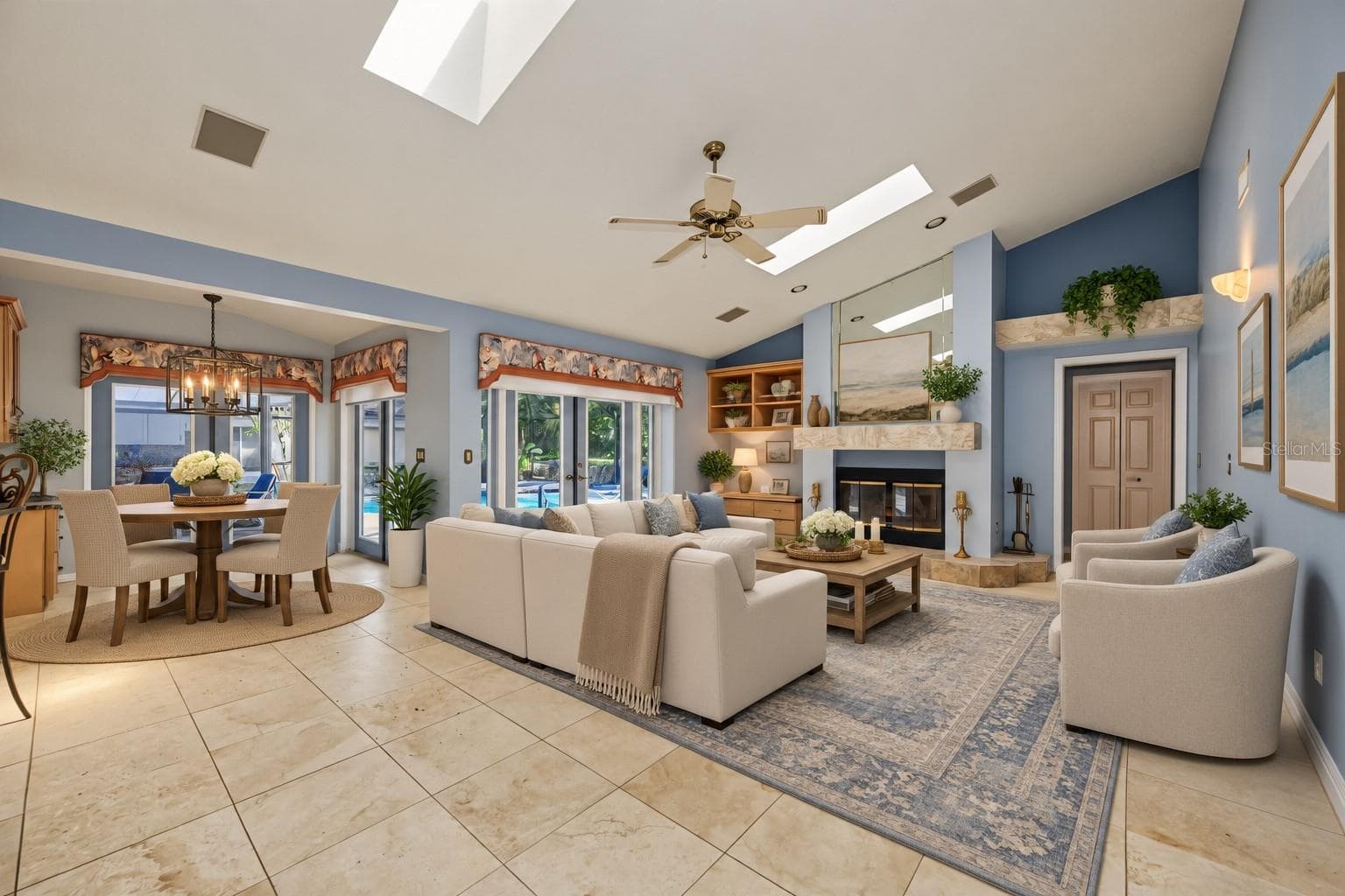 staged family room and eat in kitchen area - 2233 PINNACLE CIR S, PALM HARBOR