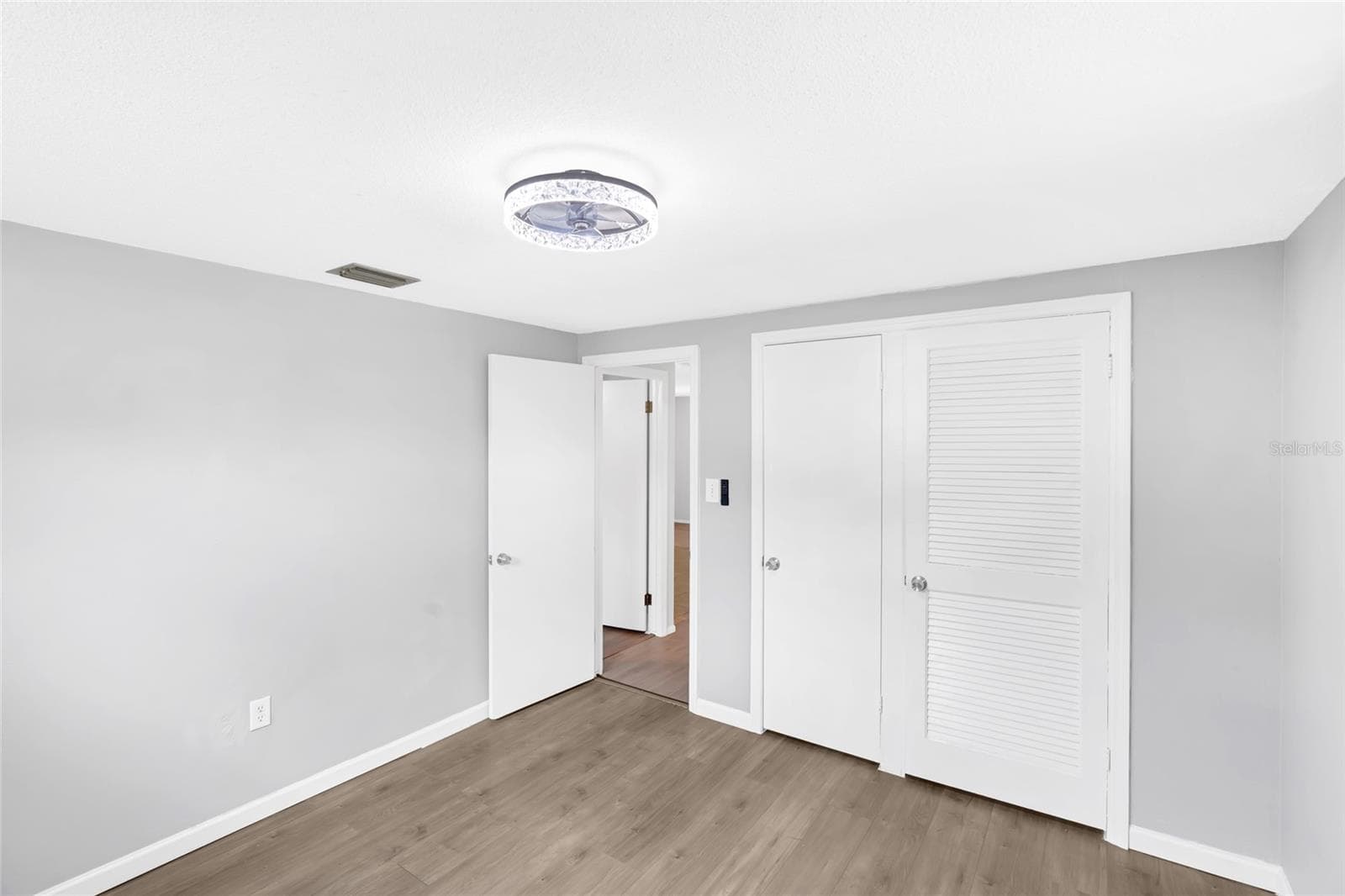 A generous closet adds practical storage to Bedroom 3 while still leaving plenty of usable floor space for a bed, desk or both. - 142 2ND AVE, NOKOMIS